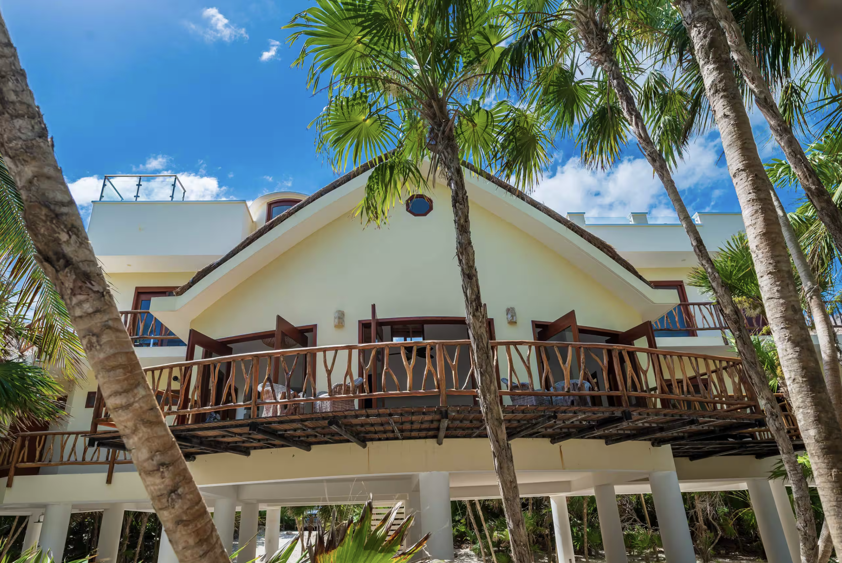Villa facade with palapa roof
