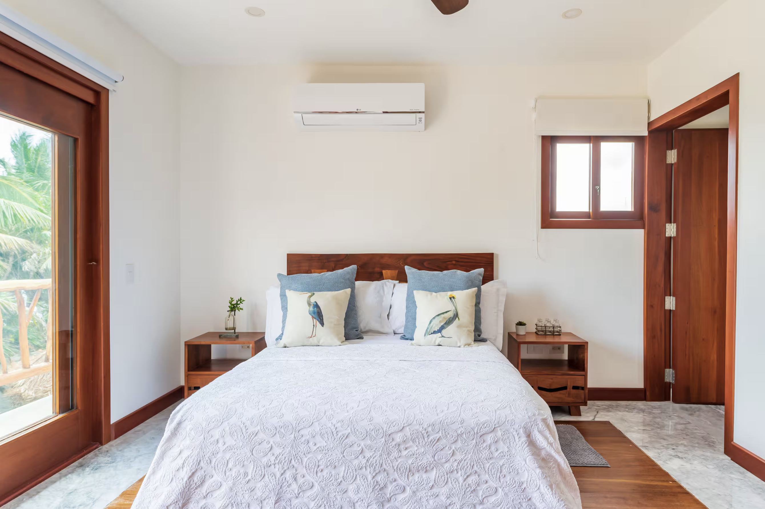 Bedroom with heron pillow accents