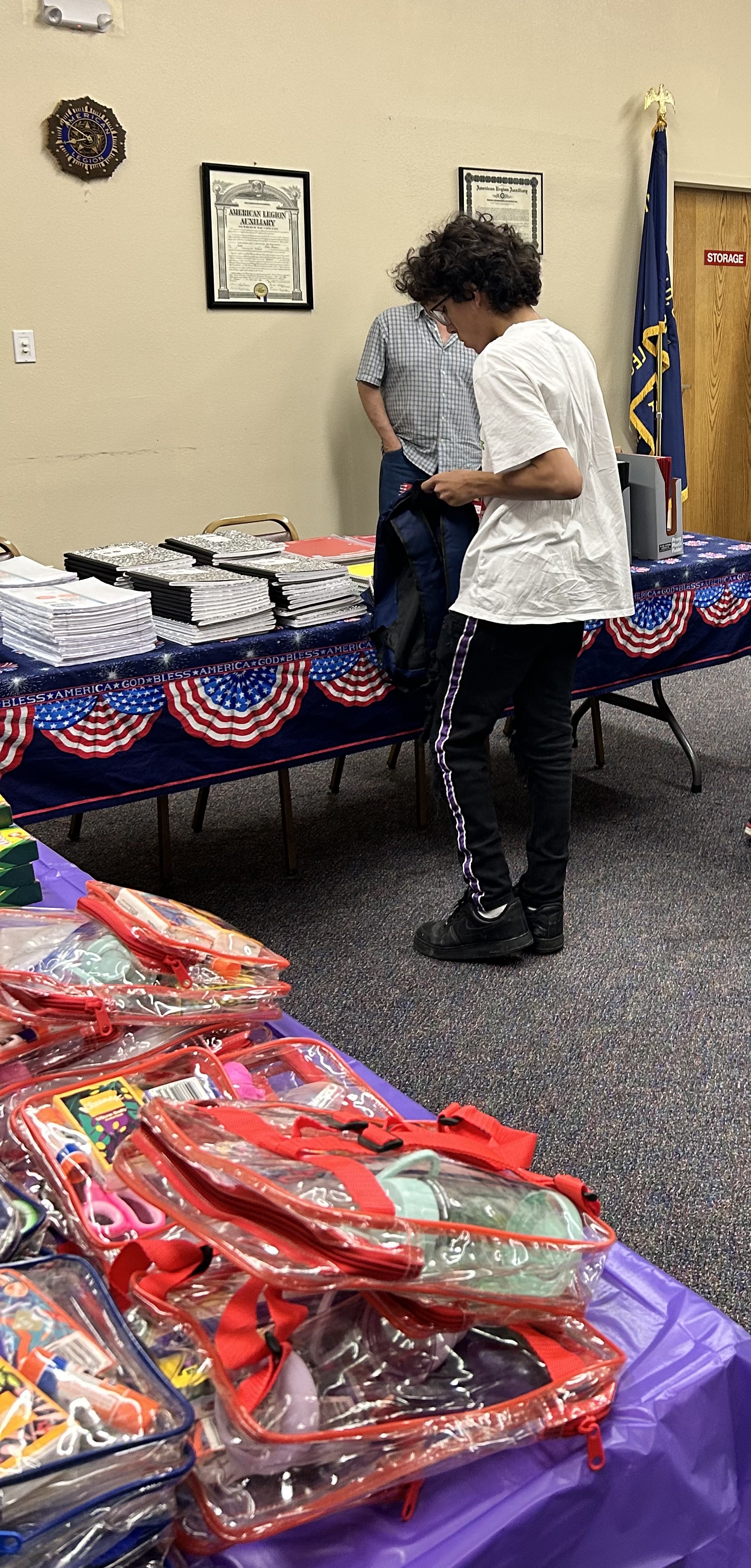 Back to school supply giveaway at Post 2 — supply tables