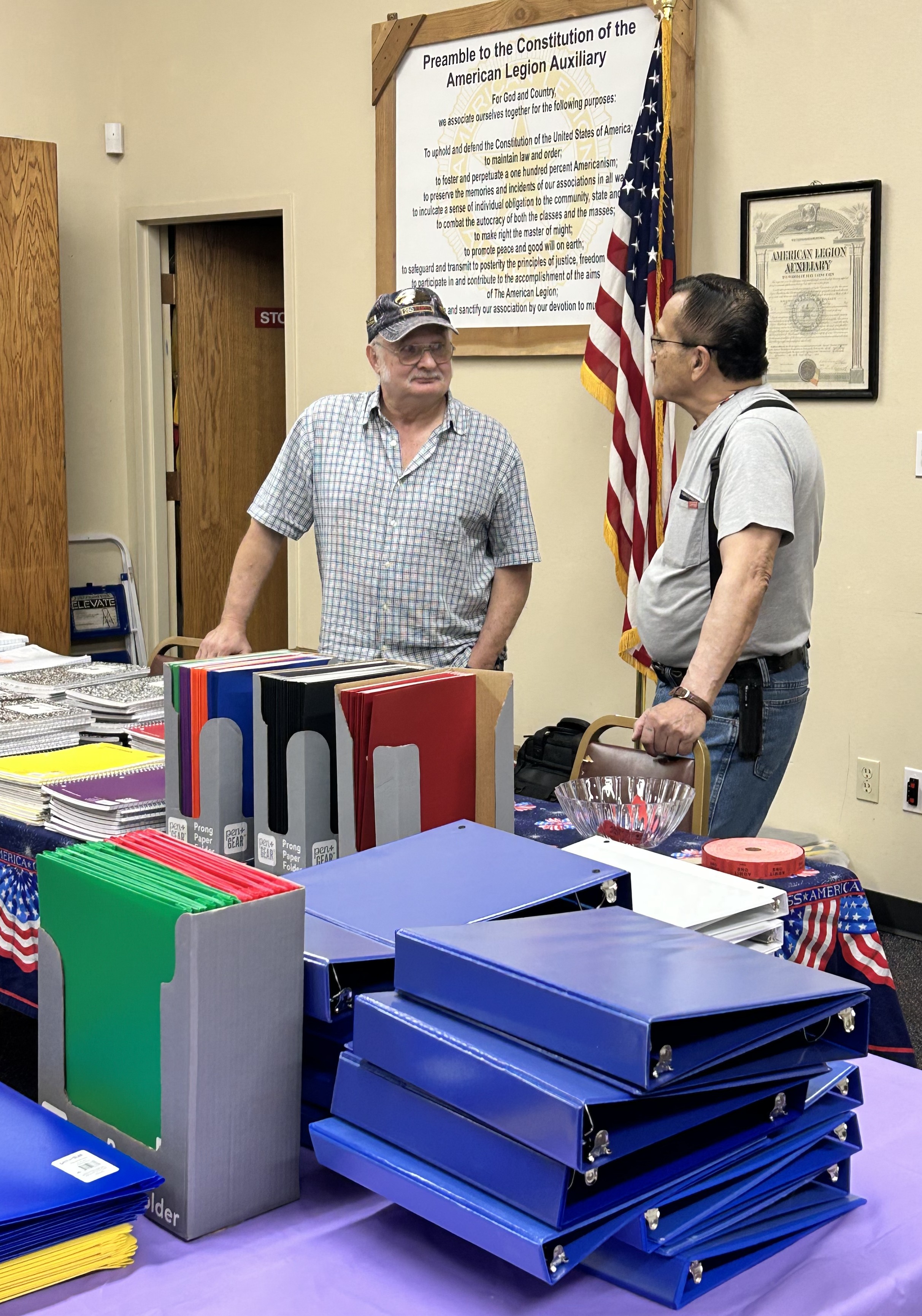 Back to school supply giveaway at Post 2 — volunteers at the table