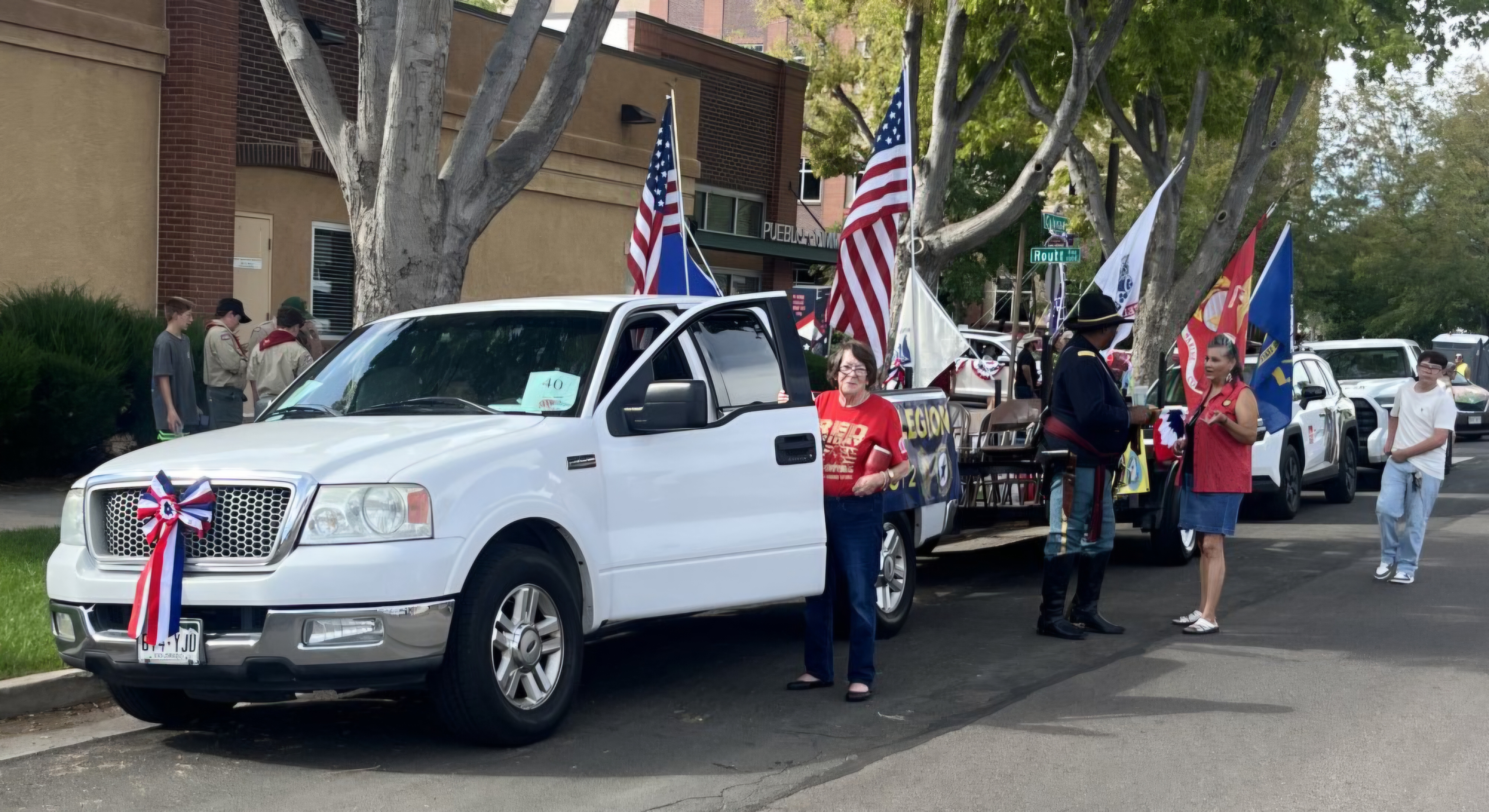2026 Colorado State Fair Parade — Post 2 float with flags and color guard