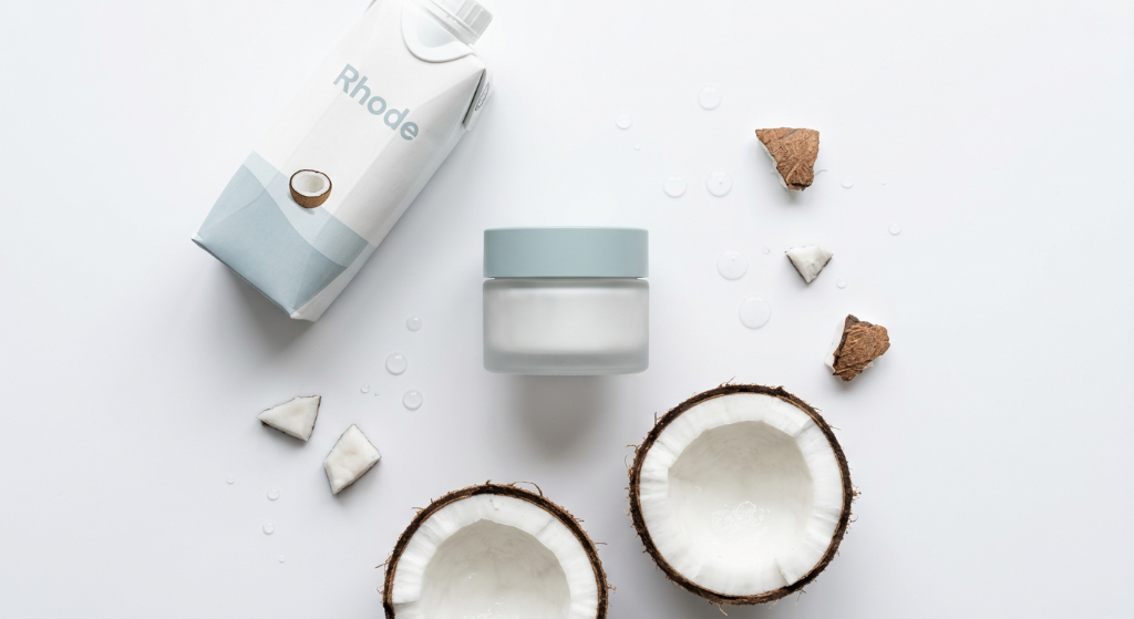 Hydra Coco Cream flatlay with coconuts