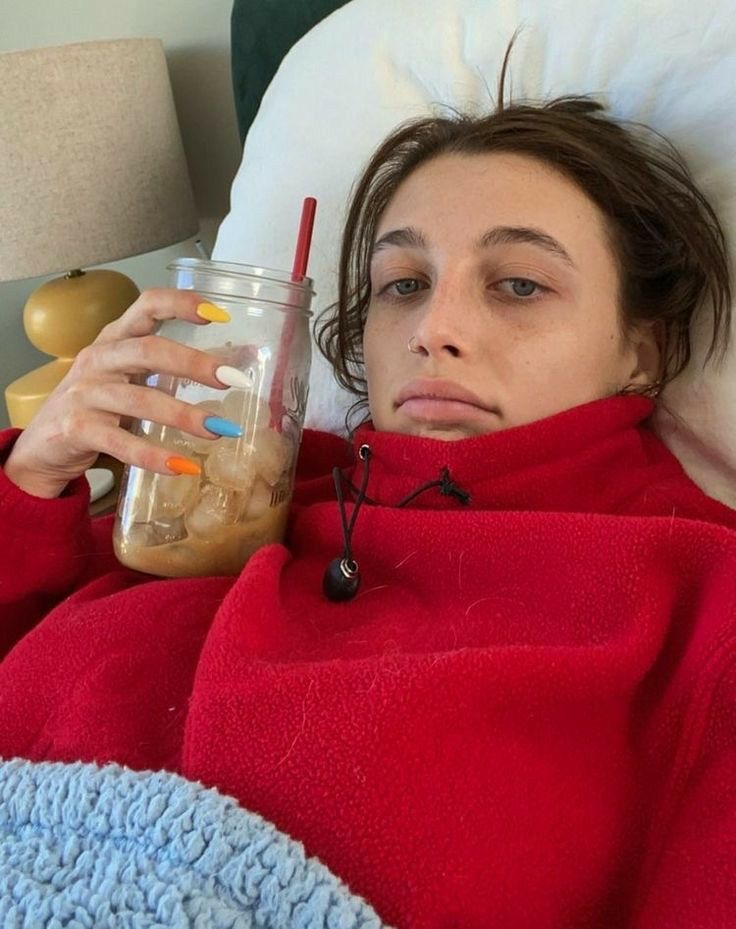 red hoodie iced coffee