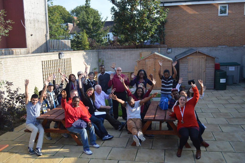 Group of people gathered outdoors at Mosaic Clubhouse London