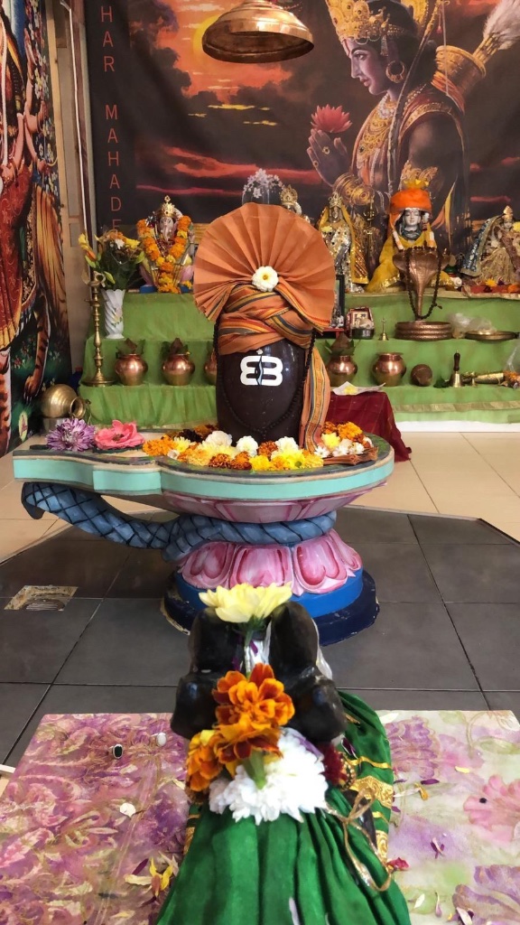 The Lingam crowned with a saffron turban bearing the sacred tripundra.