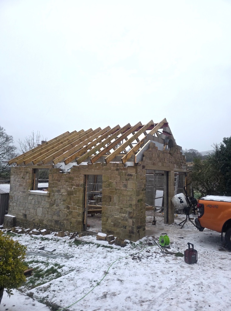 Stone building new roof construction