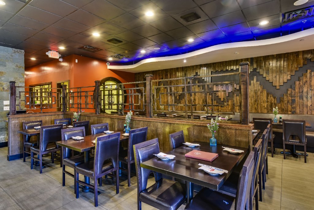Private dining room with blue accent lighting
