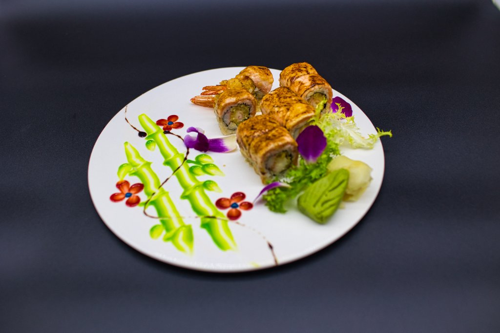 Spicy shrimp roll with red flower decor