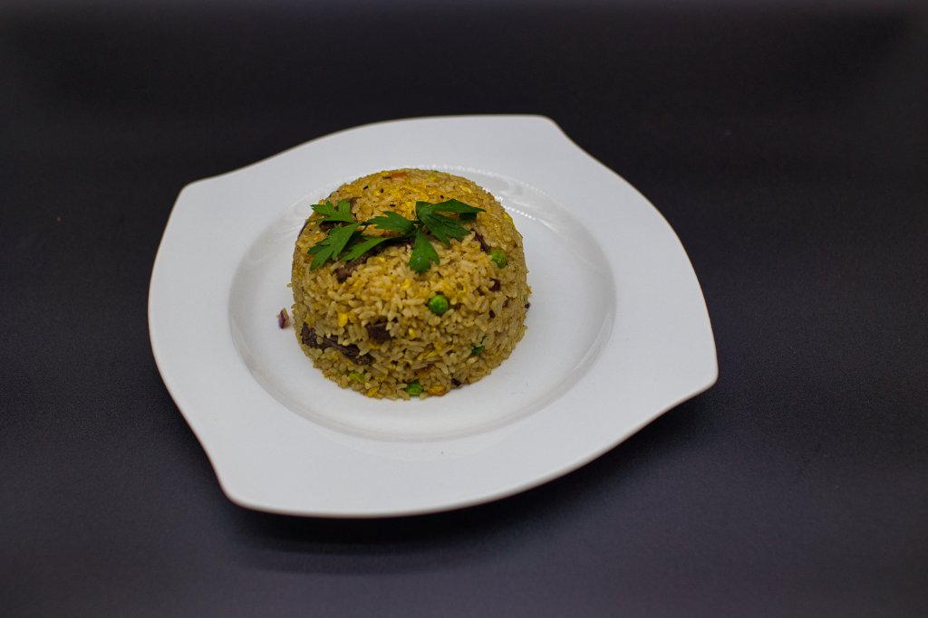 Fried rice dome garnished with parsley