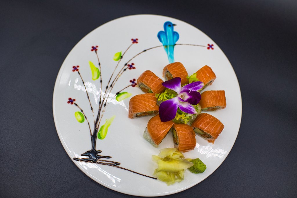 Teriyaki roll on painted ceramic plate