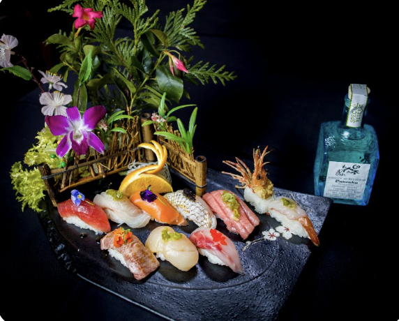 Premium sushi on stone plate with warm amber lighting