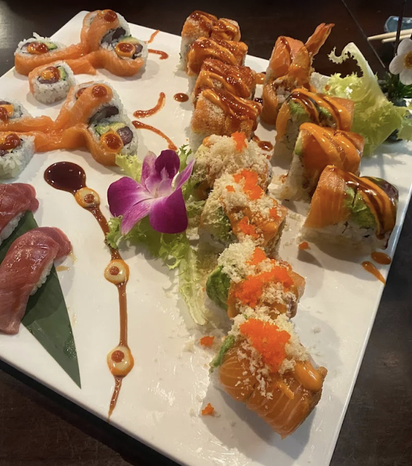 Gourmet sushi rolls with spicy tuna and tempura shrimp