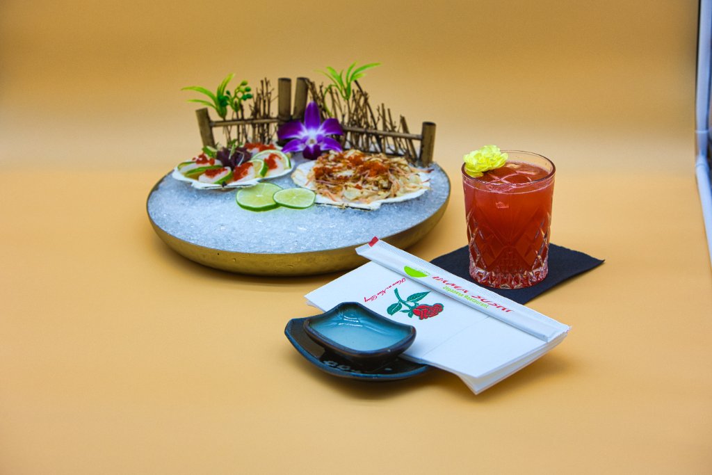 Scallop sashimi on ice overhead view