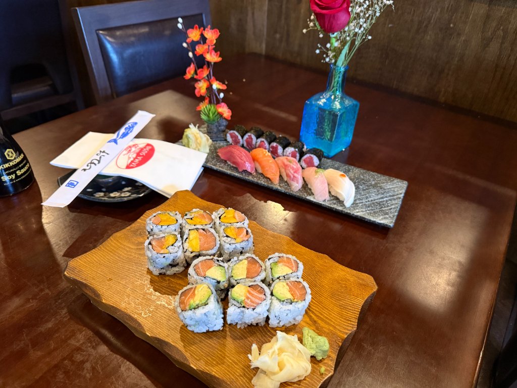 Premium sushi and sashimi platter with fresh rolls