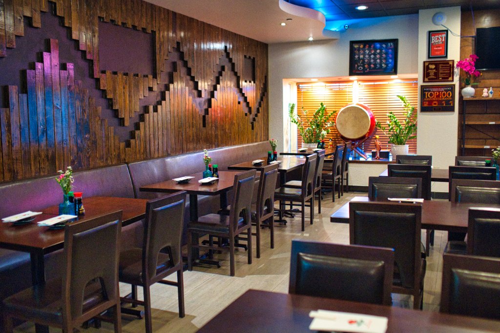 Modern dining room with geometric wall art
