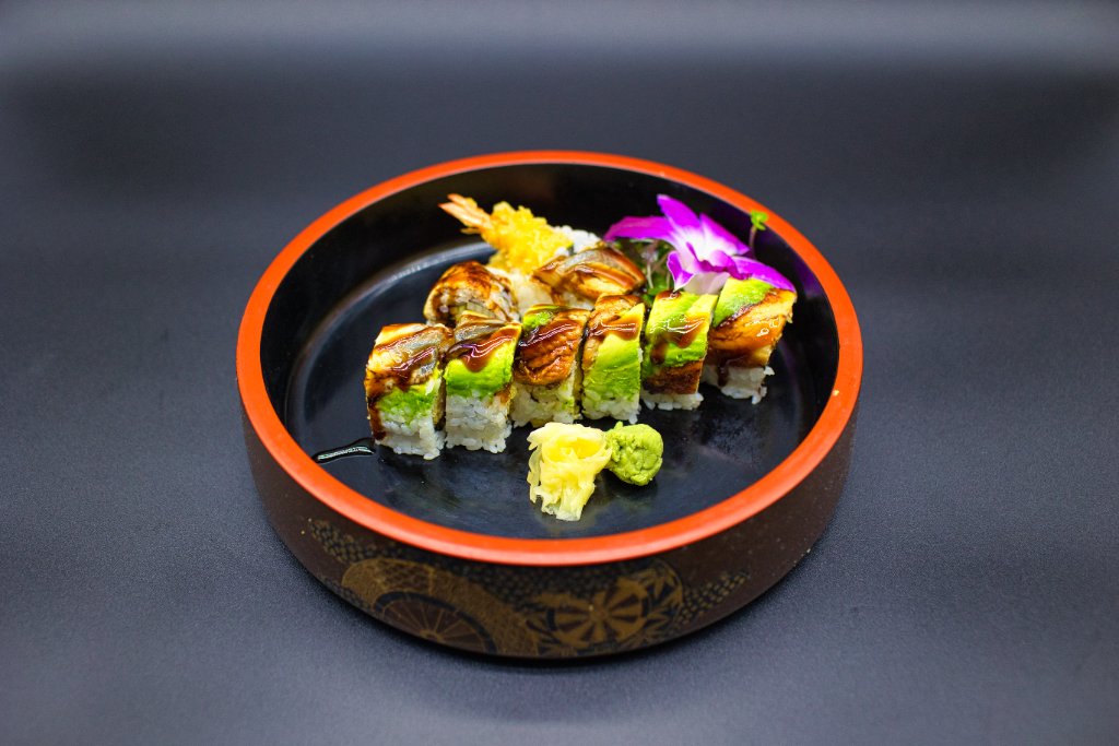 Yama roll close-up with YAMA spelled in sauce