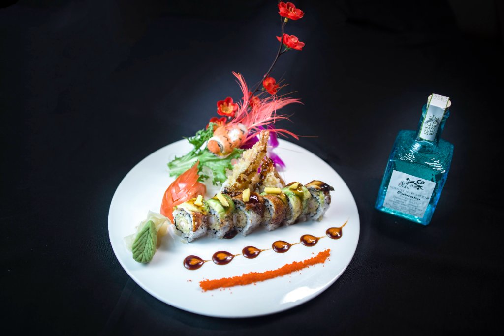 Premium sushi platter with decorative flowers
