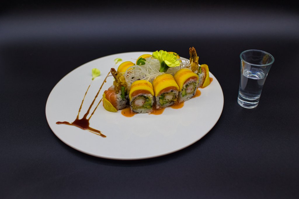 Chicken teriyaki with broccoli on white plate