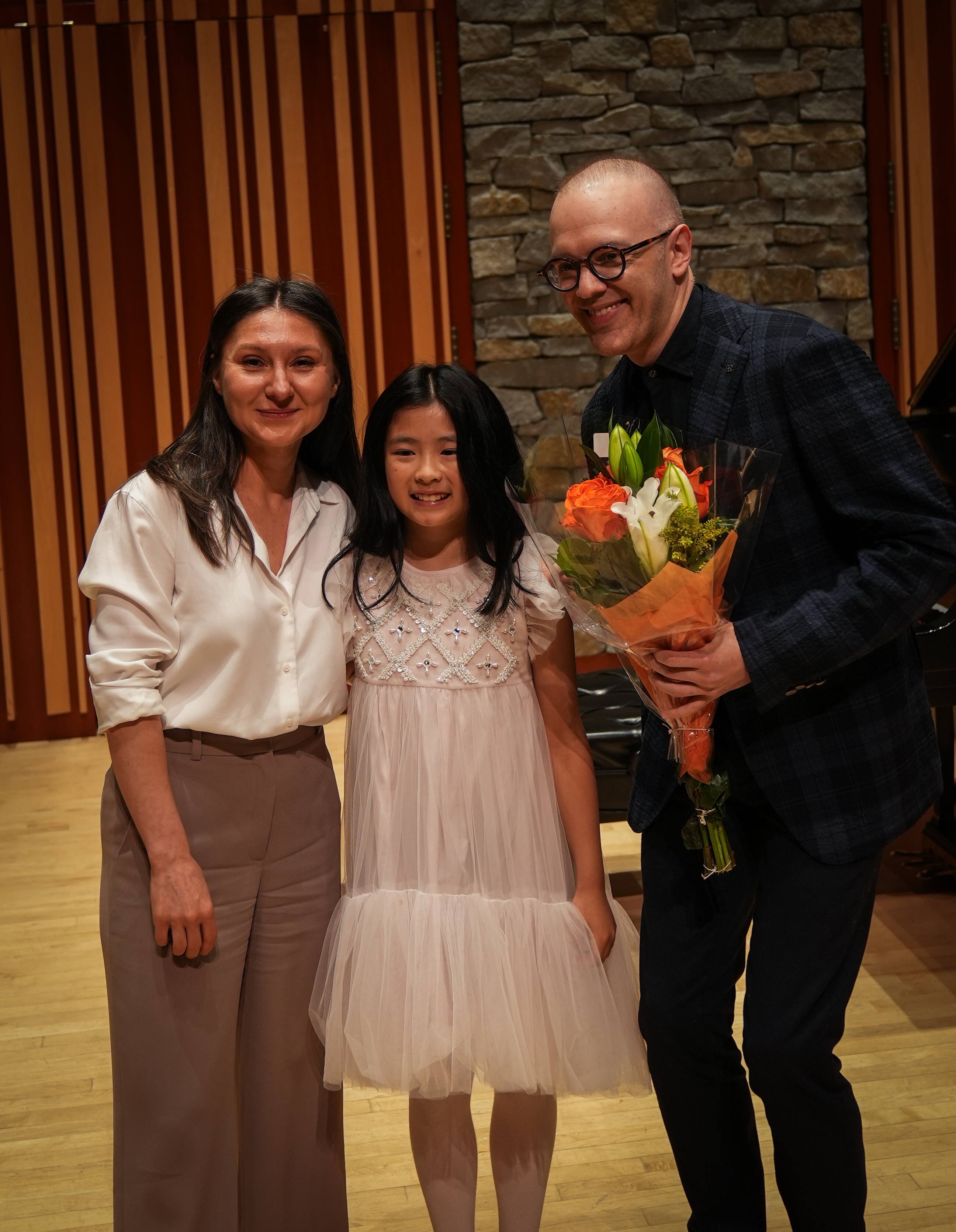 Teacher and student at piano