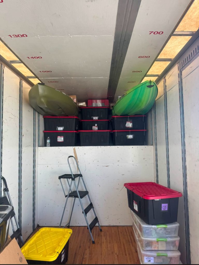 Professional movers loading a moving truck