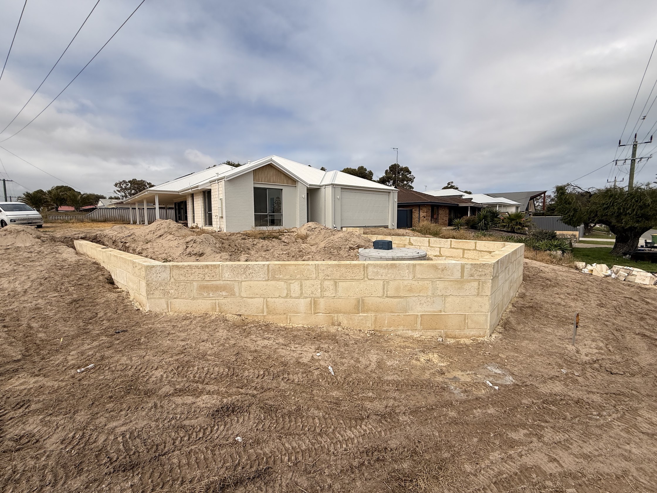 Limestone retaining wall on a new build site