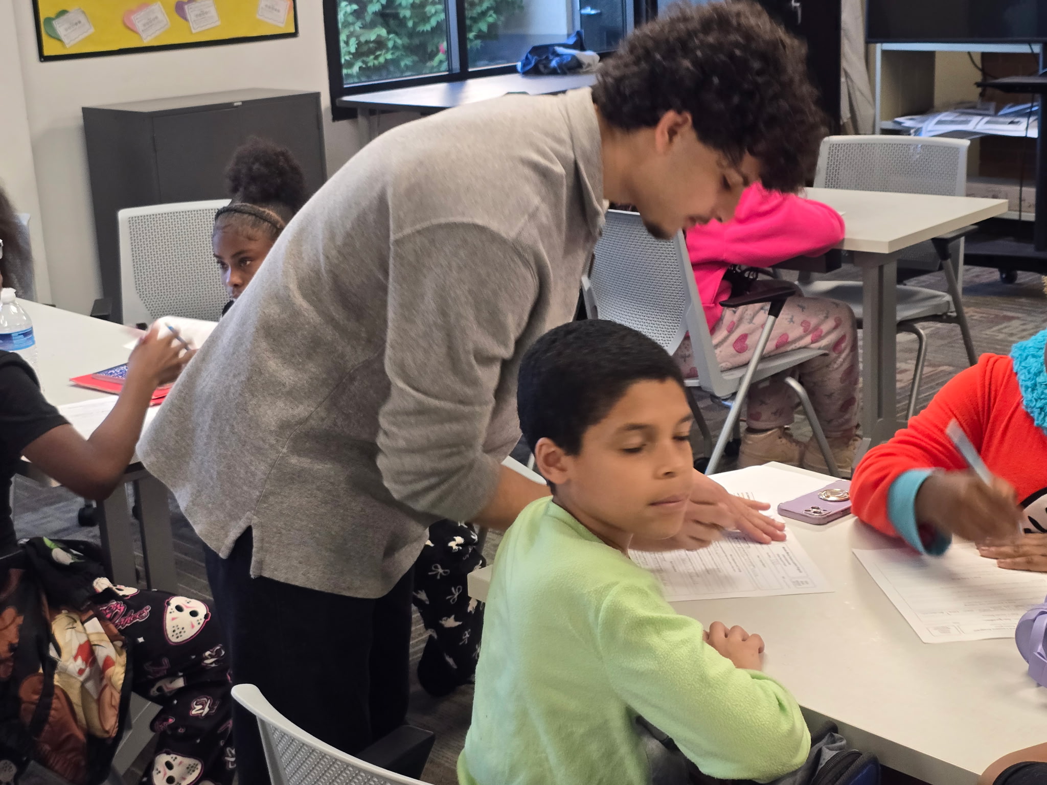 Motown Mercy volunteers working with Pontiac School District students