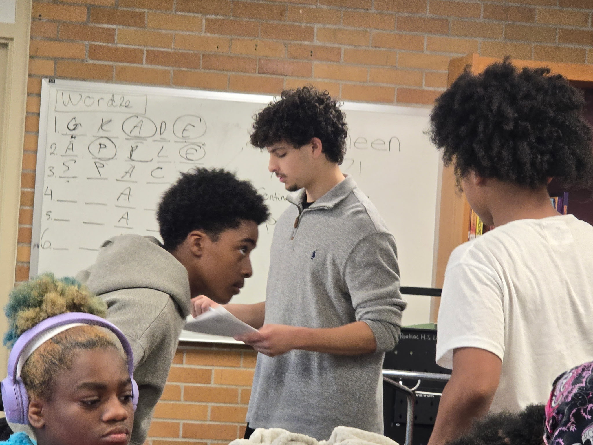 Motown Mercy volunteers working with Pontiac School District students
