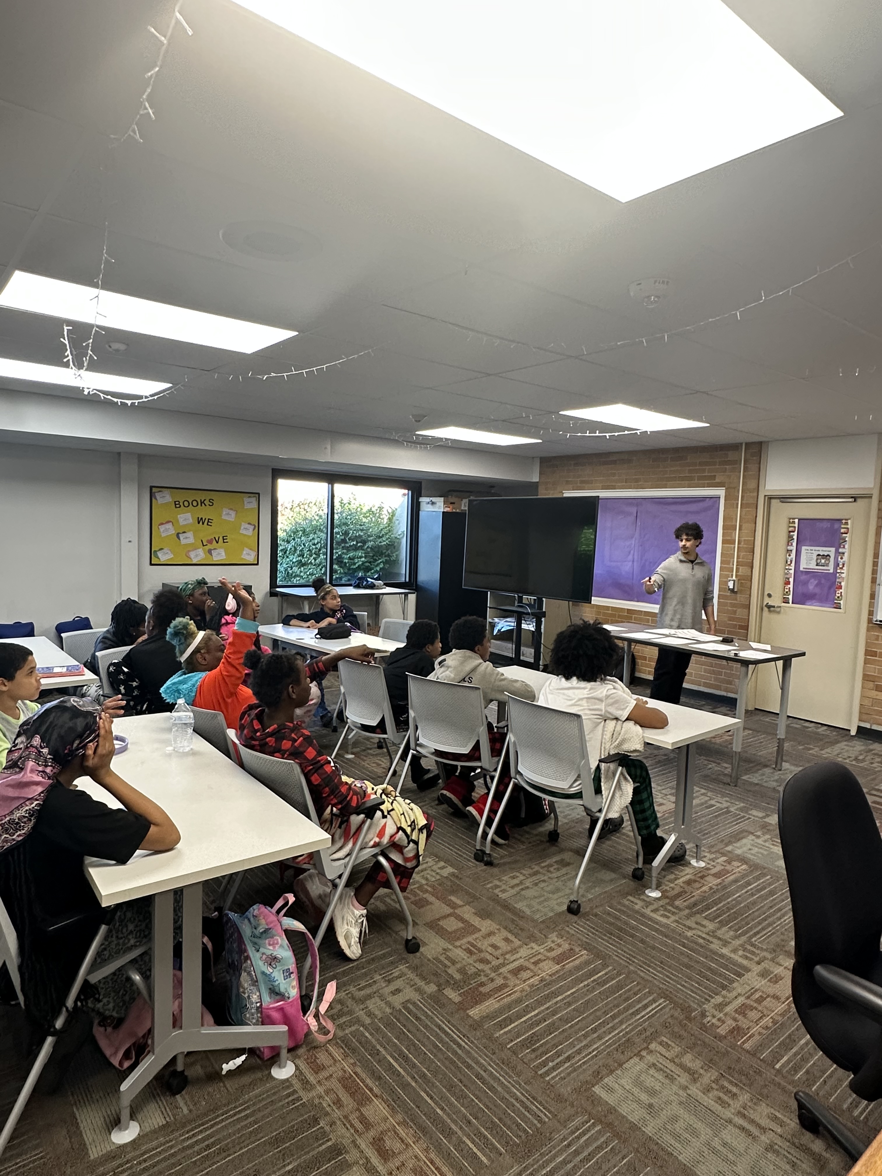 Motown Mercy volunteers working with Pontiac School District students