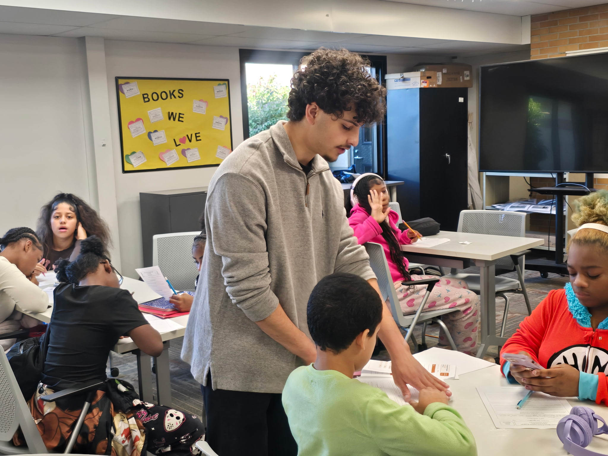Motown Mercy volunteers working with Pontiac School District students