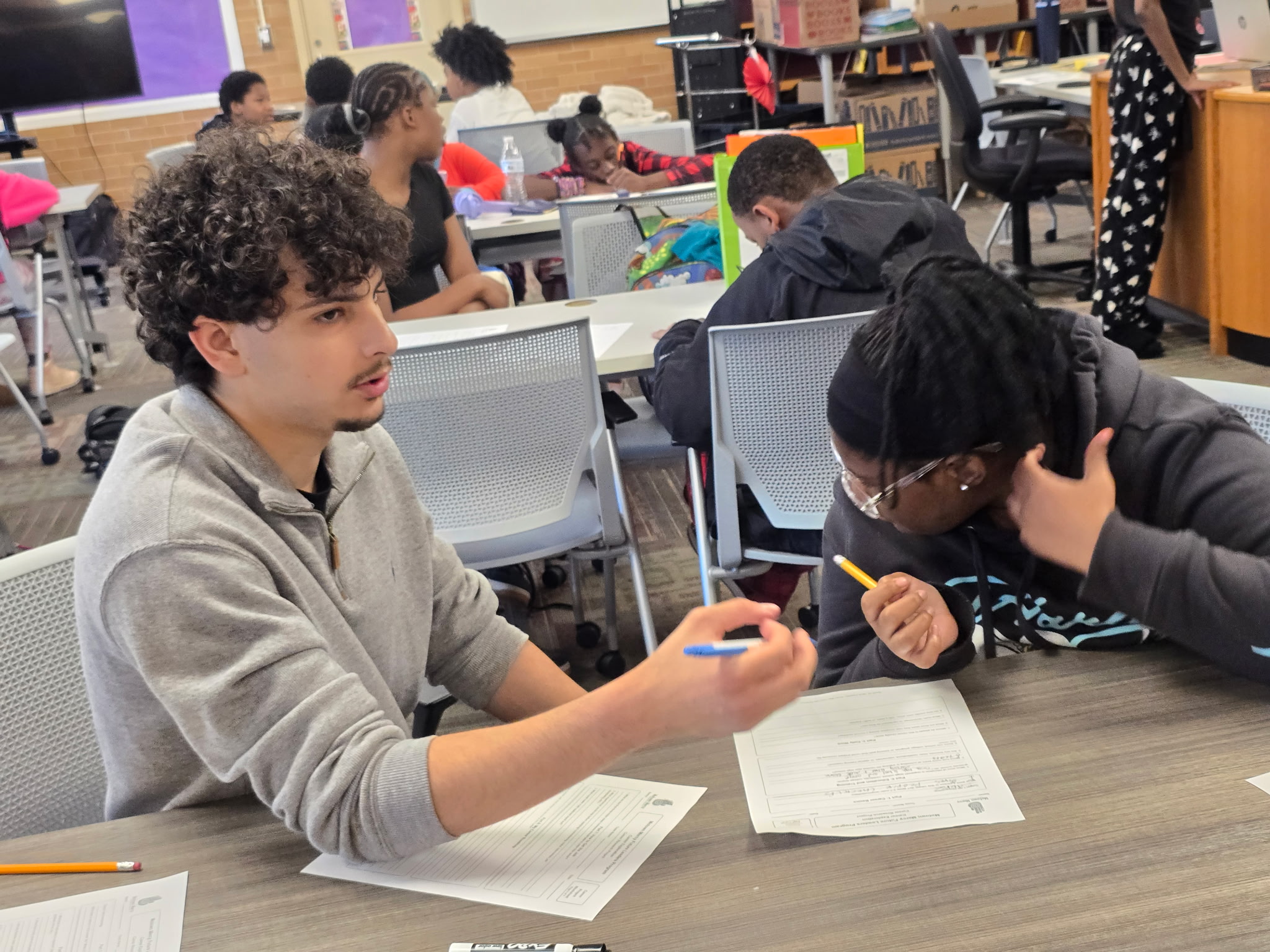 Motown Mercy volunteers working with Pontiac School District students