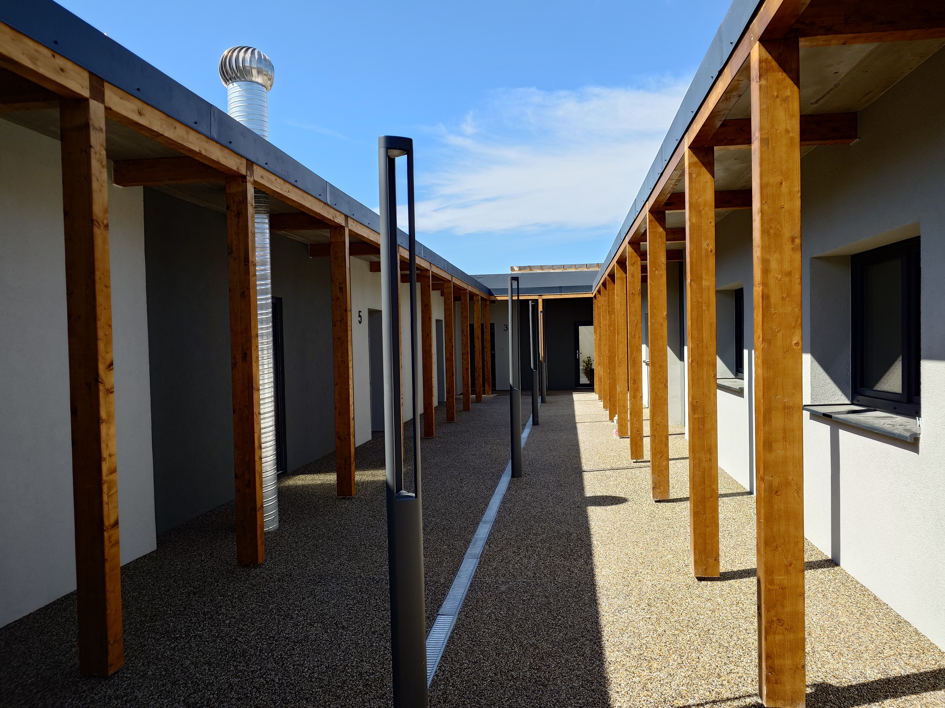 Votice Residential & Commercial Complex — Covered Walkway