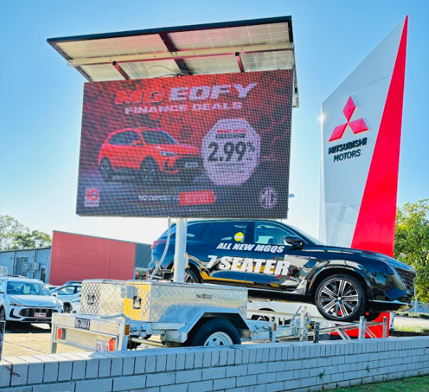 Neomax LED Advertising Trailer displaying MG EOFY Finance Deals at Mitsubishi Motors