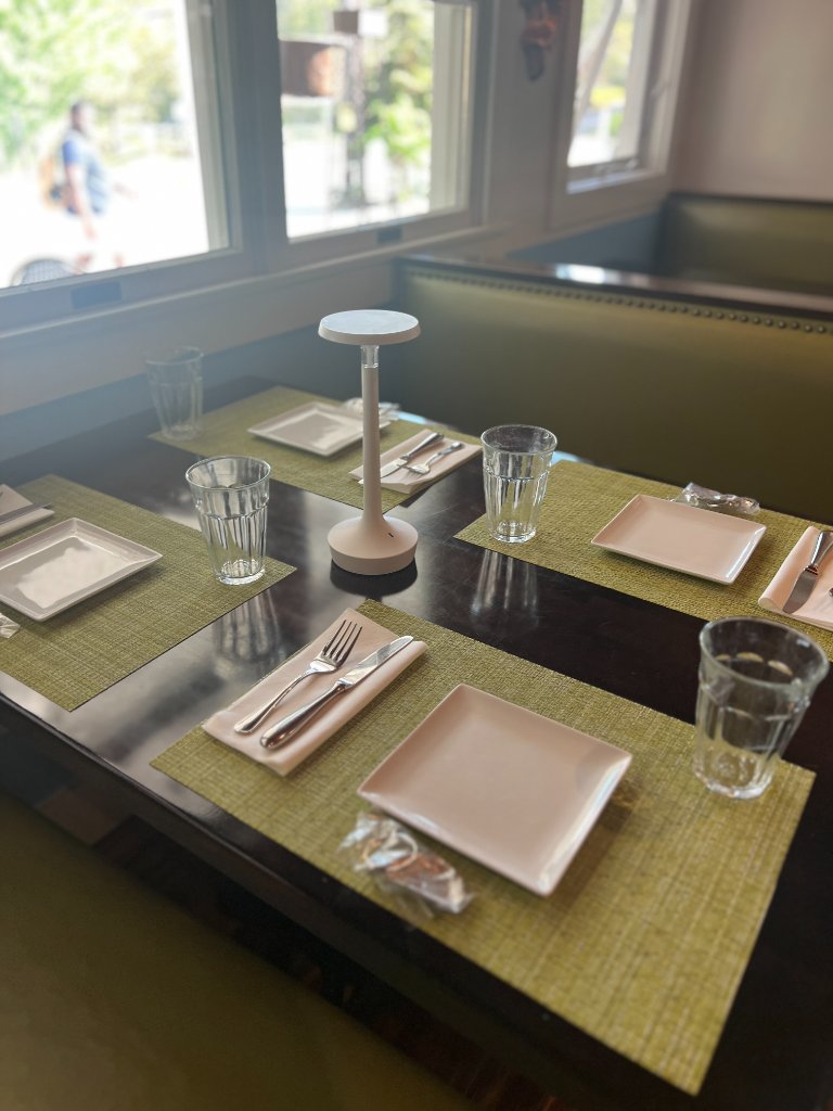 Sun-drenched dining room with linen tablecloth and Sancerre