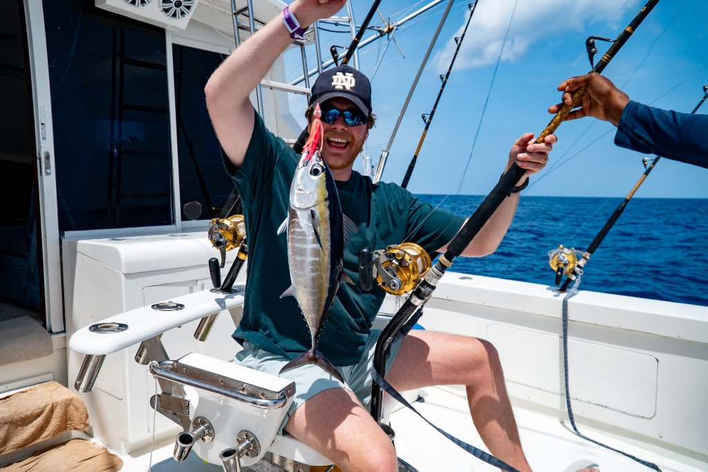 Guest holding up yellowfin tuna