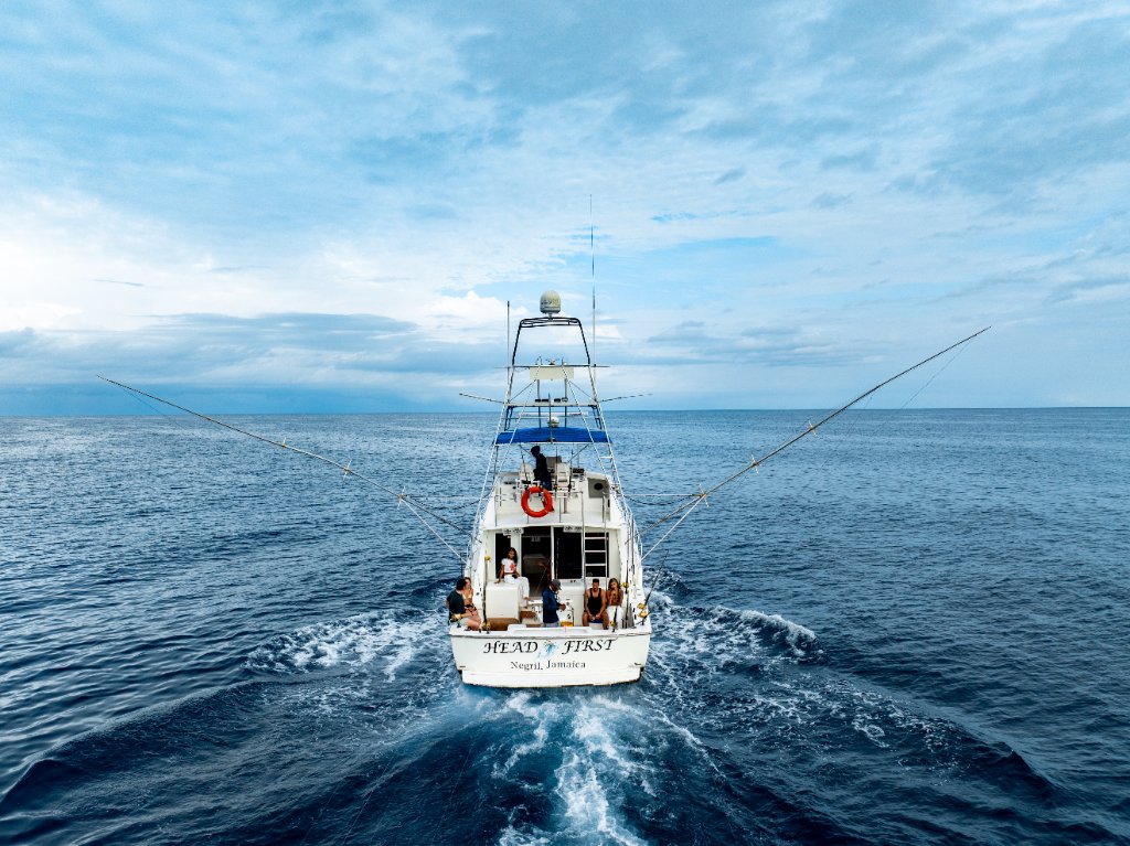 Sportfisher on calm blue water