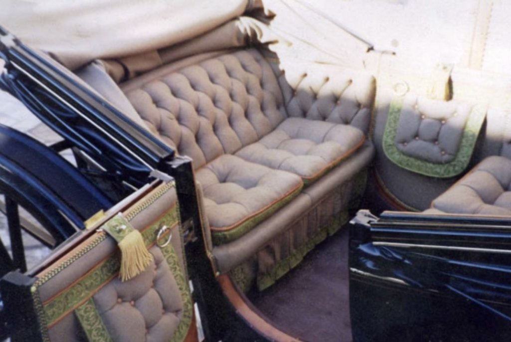 Regency carriage interior — tufted upholstery