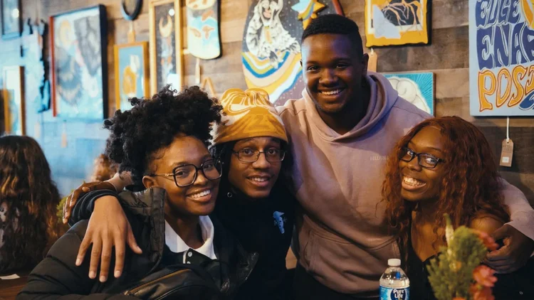 Saturday Sanctuary — group of friends gathered together in community