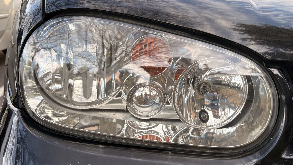 VW headlight after professional restoration — crystal-clear lens, improved night visibility, Portland Oregon