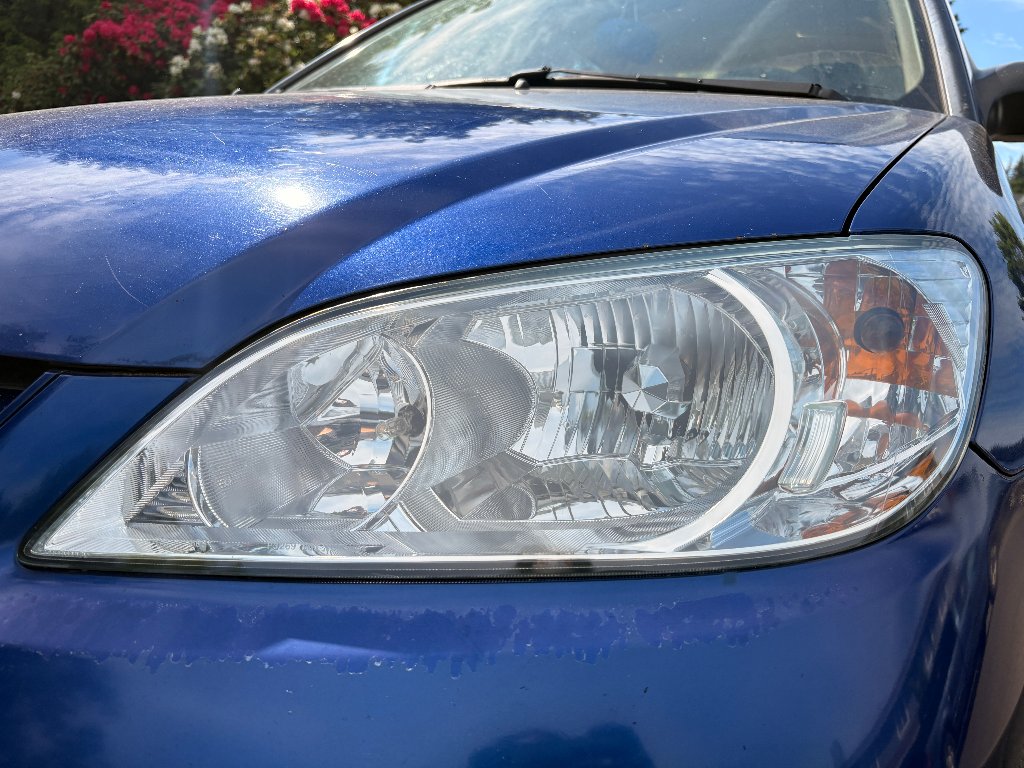 Honda Civic headlight after professional restoration — clear, bright headlight lens in Portland, OR by Bruno's Headlight Restoration
