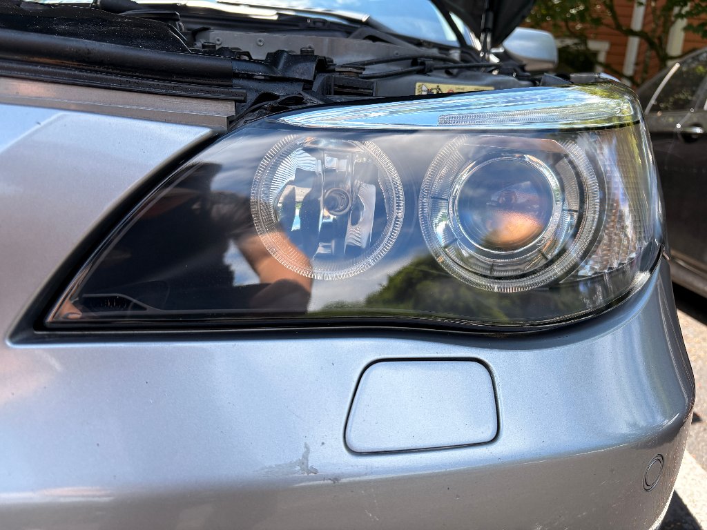 BMW 5 Series headlight after professional restoration — clear, bright headlight lens in Beaverton, OR by Bruno's Headlight Restoration