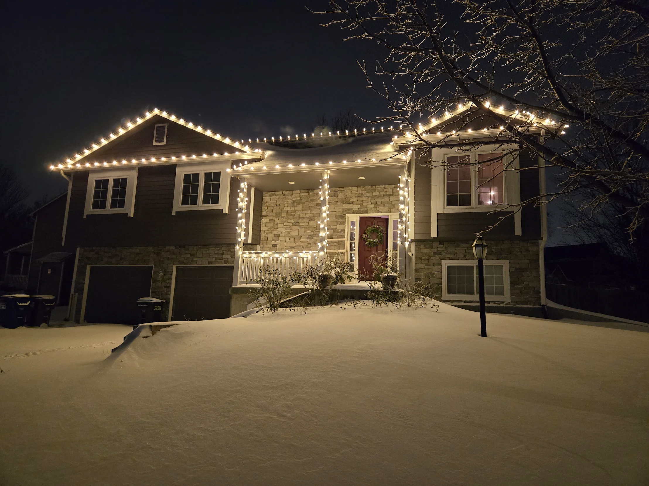 Beautiful home illuminated with professional Christmas lights