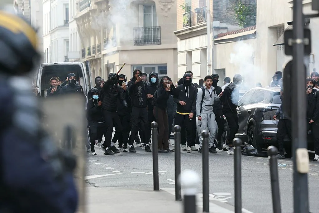 Students face off with riot police in Paris