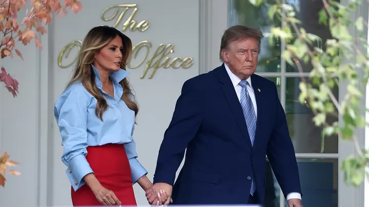 President Donald Trump and First Lady Melania Trump arrive at the Rose Garden event