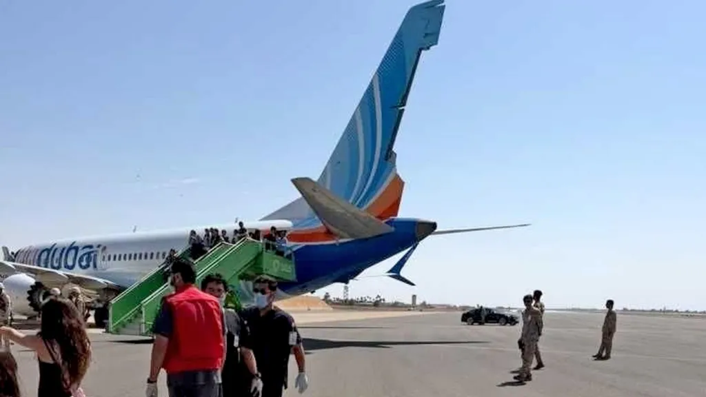 Passengers disembarking the Flydubai jet on the tarmac
