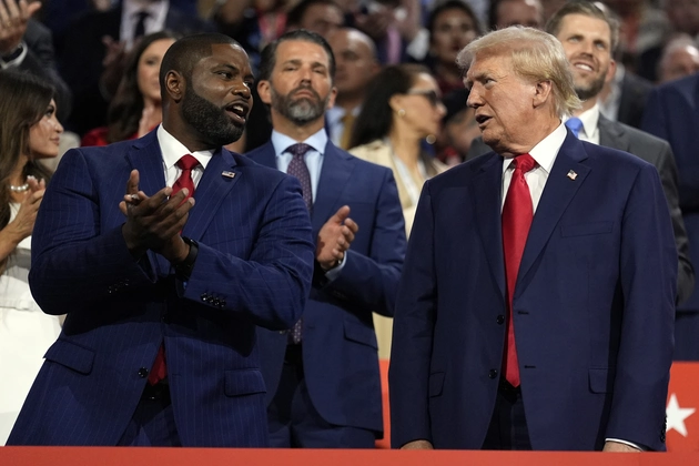 Byron Donalds and Donald Trump at a political rally