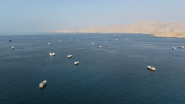 Aerial view of the Strait of Hormuz with vessels