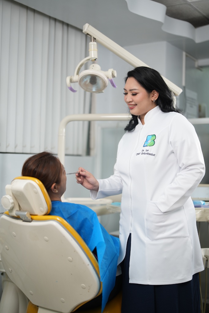 Dr. Ion treating patient