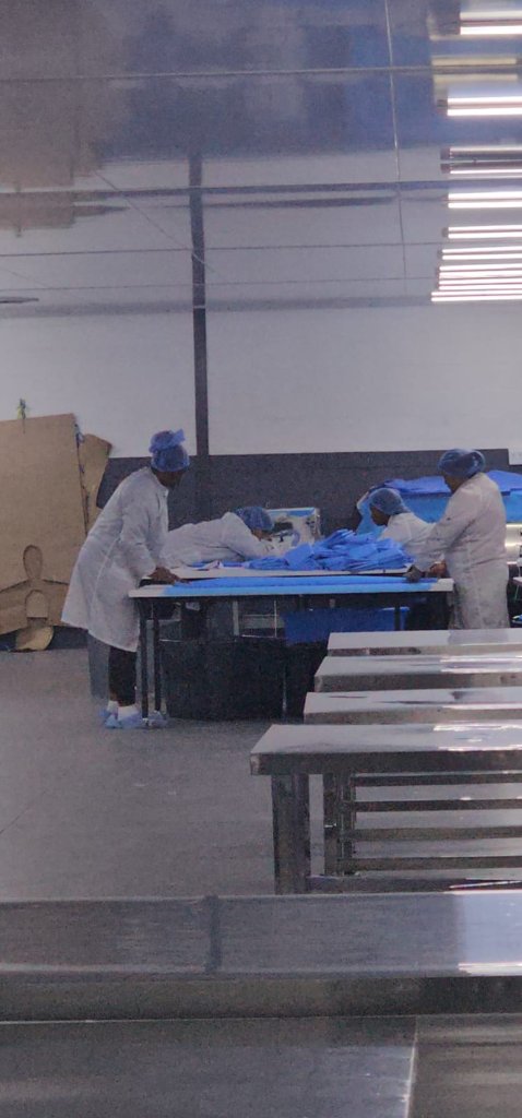 Production team assembling sterile surgical products