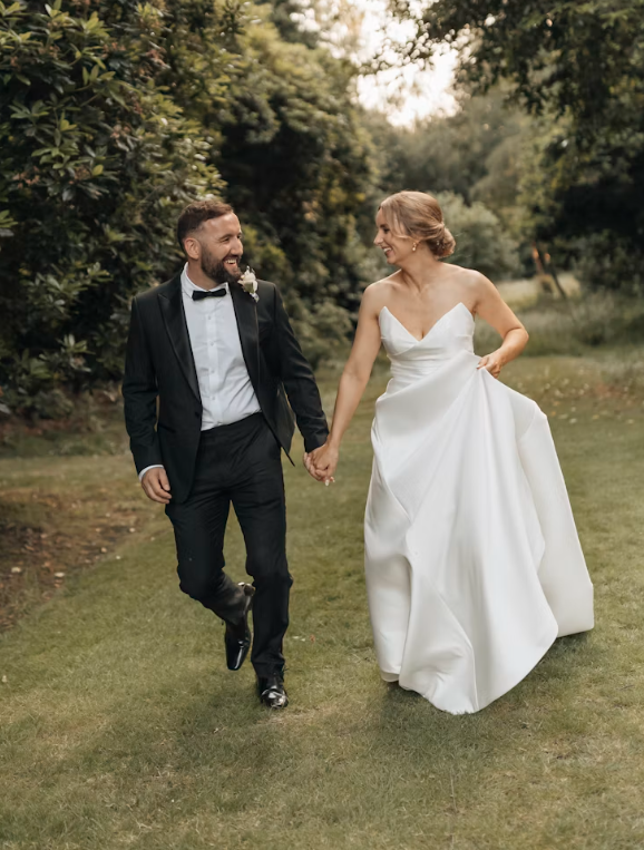Wedding couple walking together at a Beverley venue