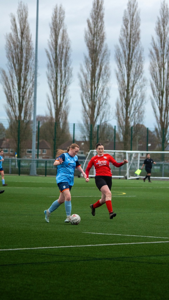 Football player dribbling